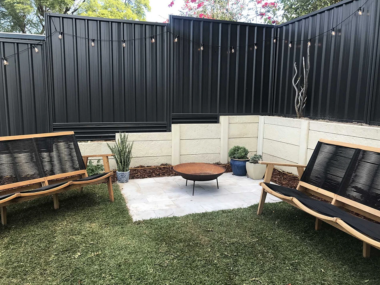 Complete steel and metal privacy fence system with matching panels and posts
